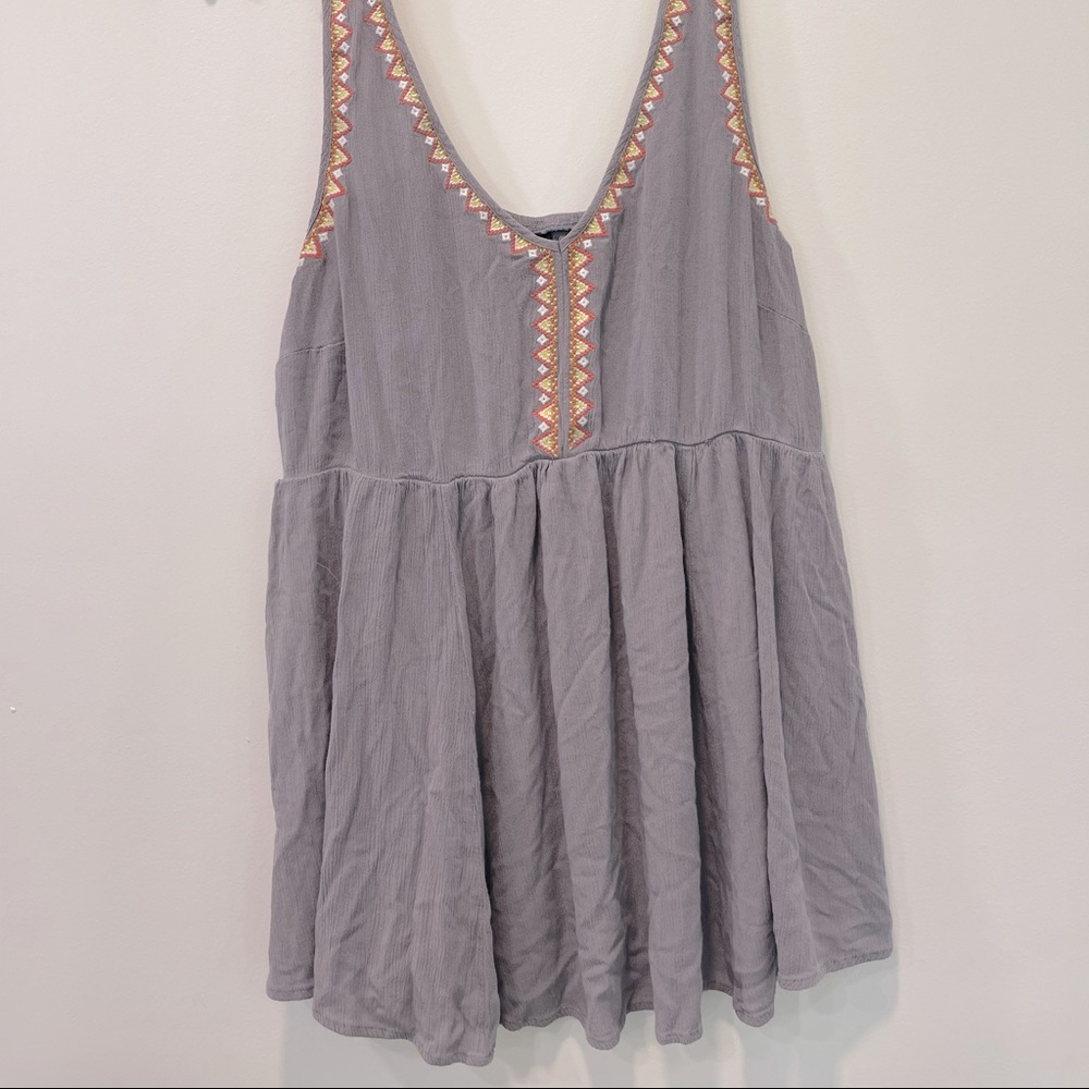Grey TORRID babydoll top with embroidery detail